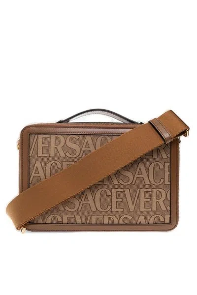 Shop Versace Versatile All-over Logo Printed Canvas Messenger Handbag In Beige For Men