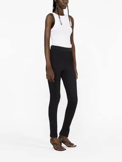 Shop Wardrobe.nyc Black Elasticated-waist Rear-slit Leggings For Women