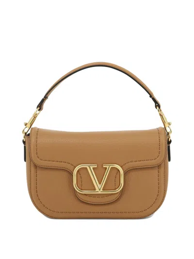 Shop Valentino Garavani "alltime" Shoulder Bag In Beige