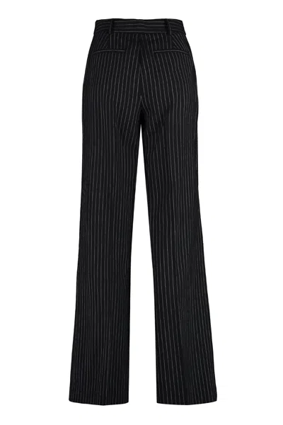 Shop Michael Michael Kors Black Pinstriped Wool Blend Trousers For Women Fw23