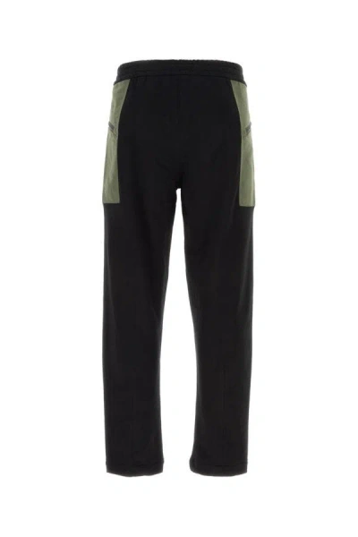 Alexander Mcqueen Contrast-pocket Cotton Track Pants In Black