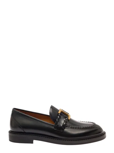 Shop Chloé 'marcie' Black Loafers With Gold-colored Metal Logo In Smooth Leather Woman