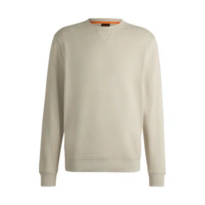 Shop Hugo Boss Cotton-terry Relaxed-fit Sweatshirt With Logo Patch In Beige