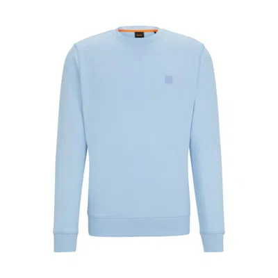Shop Hugo Boss Cotton-terry Relaxed-fit Sweatshirt With Logo Patch In Blue