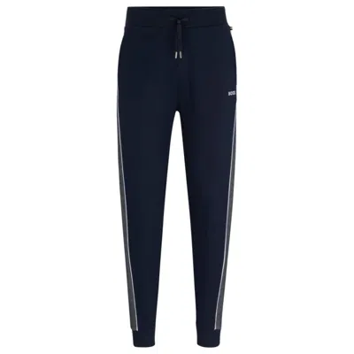 Shop Hugo Boss Tracksuit Bottoms With Embroidered Logo In Blue