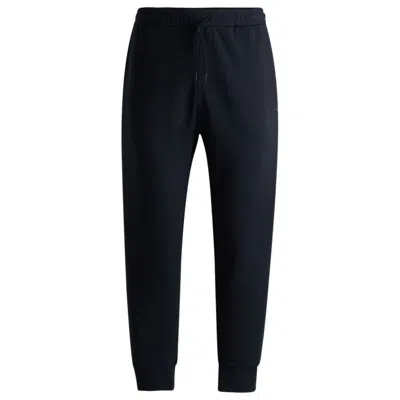 Hugo Boss Stretch-cotton Tracksuit Bottoms With Logo Print In Blue