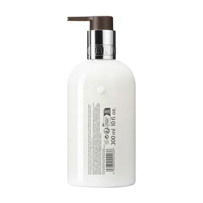 Molton Brown Sunlit Clementine And Vetiver Body Lotion In White