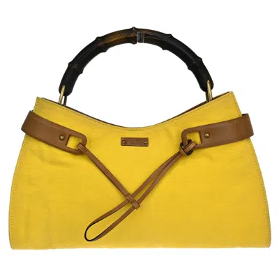 Shop Gucci Bamboo Yellow Canvas Shoulder Bag ()