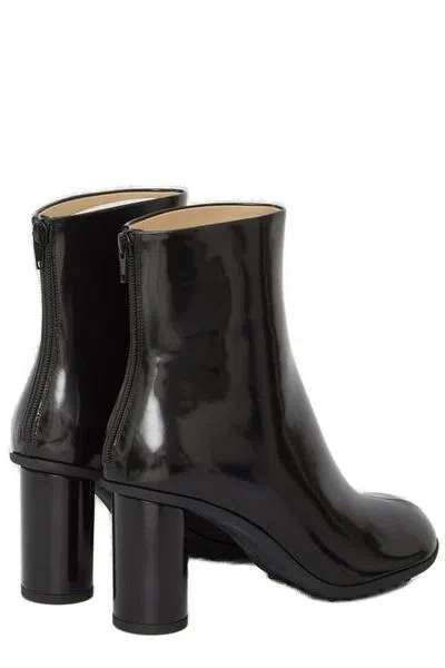 Shop Bottega Veneta Black Shiny Ankle Boots With Lugged Rubber Sole For Women