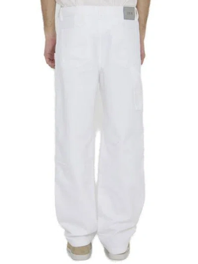 Shop Dior Carpenter-style Jeans In White