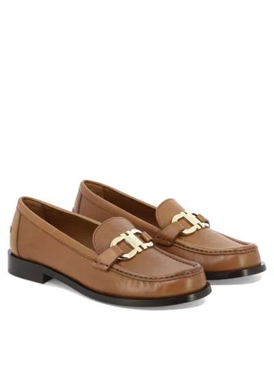 Shop Ferragamo Brown Leather Slip-on Loafers With Gancini Hook Buckle For Women
