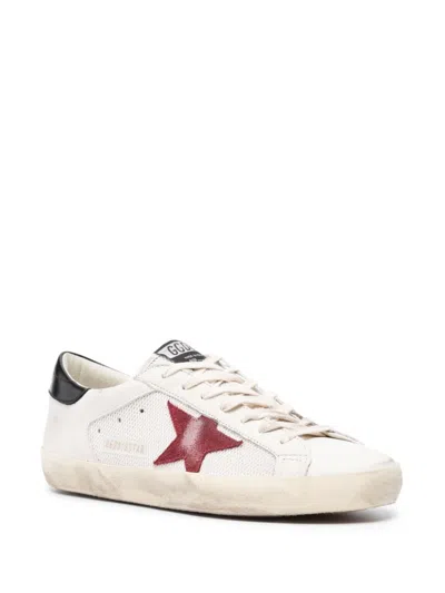 Shop Golden Goose Men's White Deluxe Low Top Sneakers With Iconic Red Suede Star