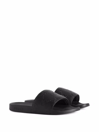 Shop Gucci Classic Gg Embossed Raffia Slide Sandals For Men In Black