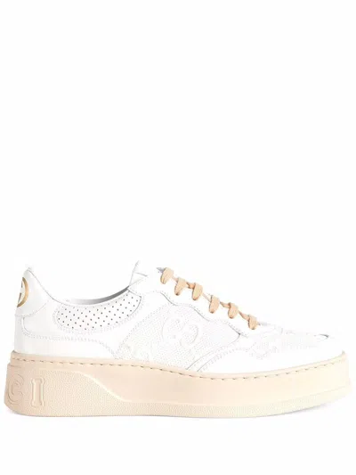 Shop Gucci Embossed Lace-up Sneakers For Women In White