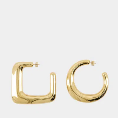 Shop Jacquemus Les Grandes Creoles Ovalo Earrings In Gold