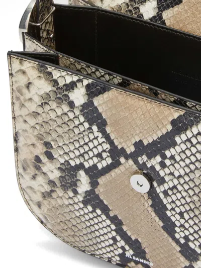 Shop Jil Sander Coin Leather Medium Crossbody Handbag In Tan