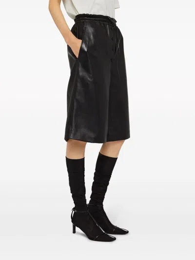 Shop Jil Sander Leather Shorts In Black