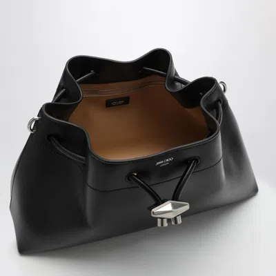 Shop Jimmy Choo Cinch M Black Leather Bucket Handbag