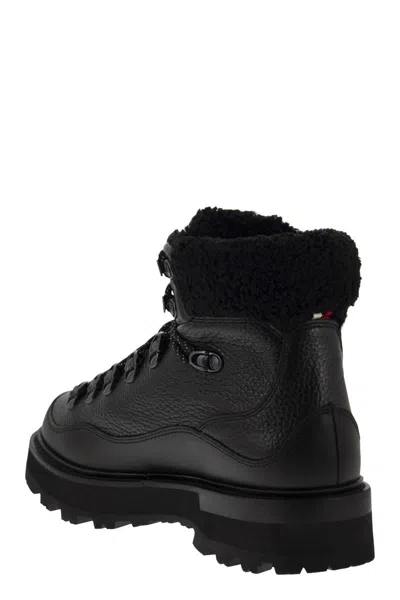 Shop Moncler Black Tasselled Leather Boots With Water-repellent Treatment For Women