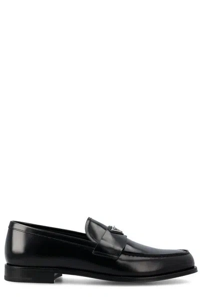 Shop Prada Premium Leather Almond Toe Loafers For Men In Black