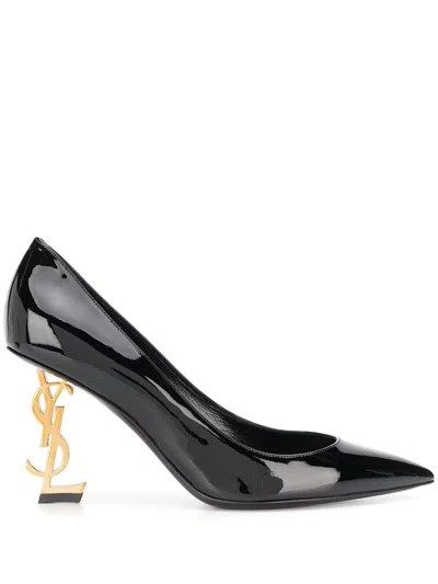 Shop Saint Laurent Sleek Black Leather Pumps With Sculptural Gold-tone Heels For Women