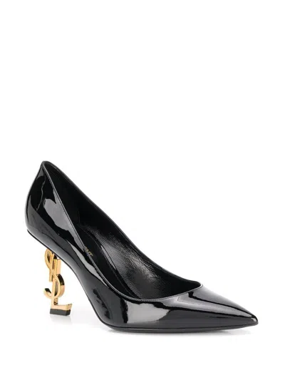 Shop Saint Laurent Sleek Black Leather Pumps With Sculptural Gold-tone Heels For Women