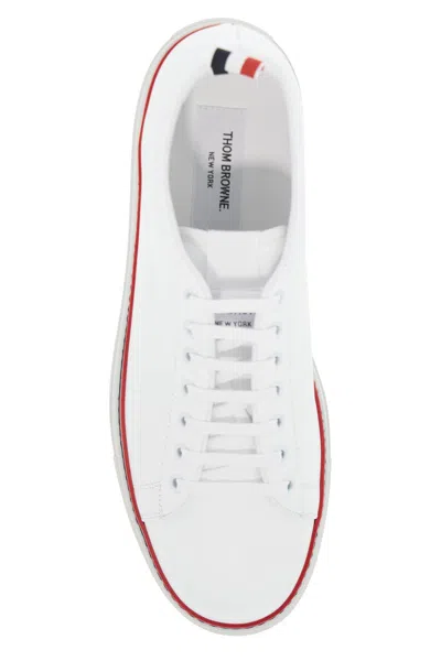 Shop Thom Browne Minimal Design Leather Sneakers With Tricolor Detail For Men In White