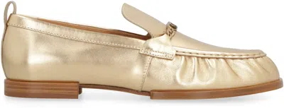 Shop Tod's Aged Gold Leather Loafers With Gathered Detail And Metal Horsebit For Women