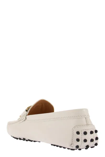 Shop Tod's White Handmade Rubber Moccasin Loafers For Women In Ivory