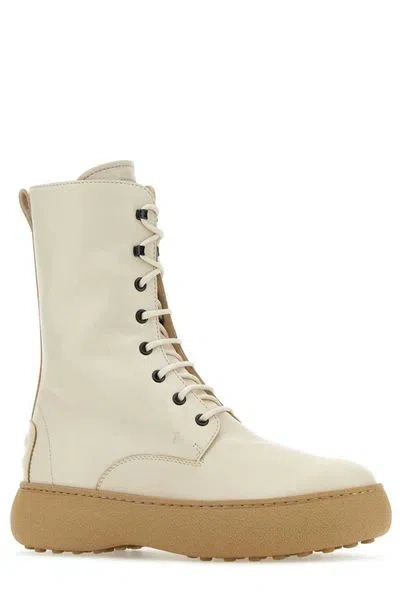 Shop Tod's Elevate Your Style With W.g. Round Toe Lace-up Boots In Cream