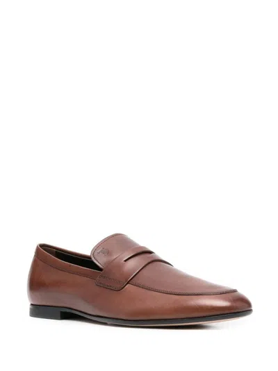 Shop Tod's Luxury Cognac Penny Strap Loafers For Men In Brown