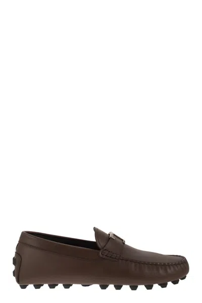 Shop Tod's Men's Leather Moccasins With Grommet Detail And Rubber Sole In Brown