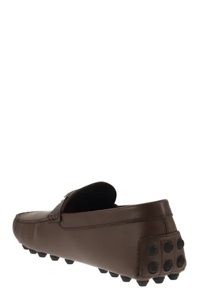 Shop Tod's Men's Leather Moccasins With Grommet Detail And Rubber Sole In Brown