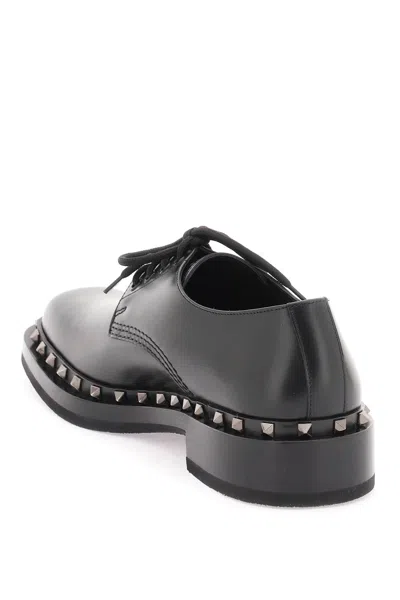 Shop Valentino Men's Rockstud M-way Derby Dress Shoes In Black For Fw23
