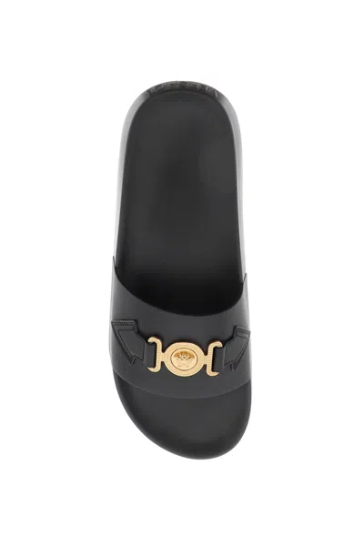 Shop Versace Black Leather Slide Sandals With Gold-tone Medusa Plaque For Women