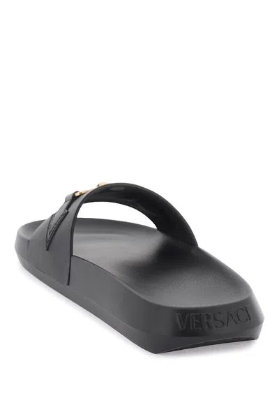 Shop Versace Black Leather Slide Sandals With Gold-tone Medusa Plaque For Women
