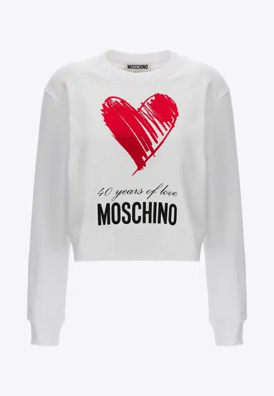 Shop Moschino 40 Years Of Love Pullover Sweatshirt In White