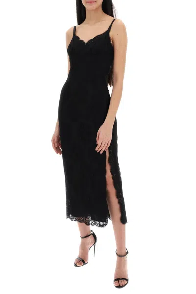 Shop Dolce & Gabbana Midi Lace Dress With Slit In 黑色的