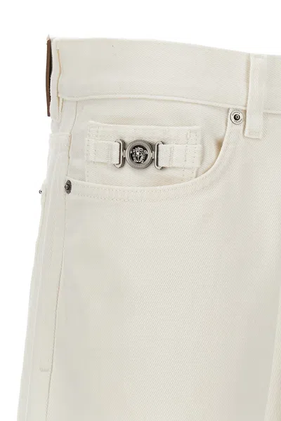 Shop Versace Men Logo Horsebit Jeans In White