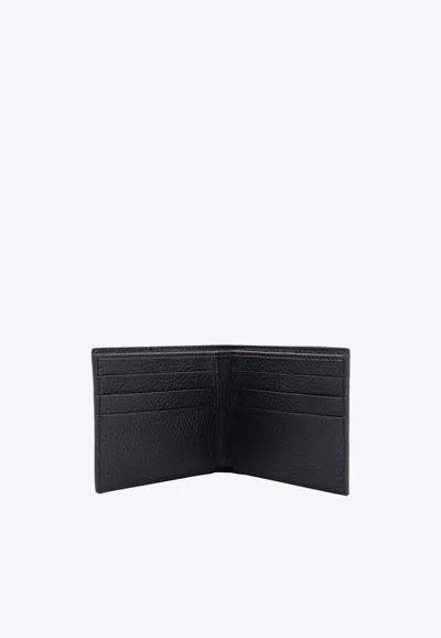 Shop Dolce & Gabbana Bi-fold Dg Logo Leather Wallet In Black