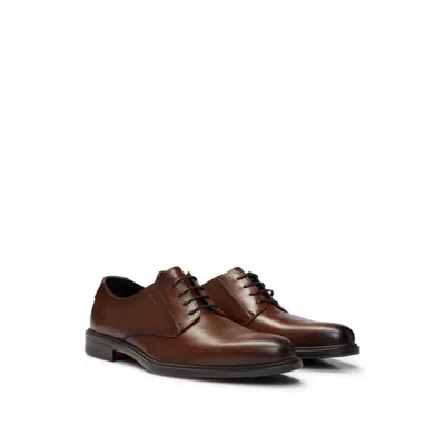Shop Hugo Derby Shoes In Nappa Leather With Embossed Logo In Brown
