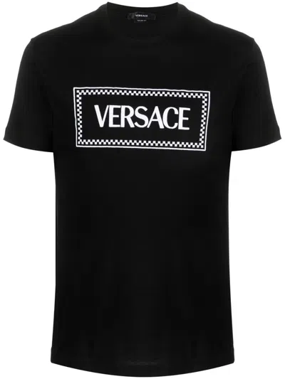 Shop Versace T-shirts & Tops In Black