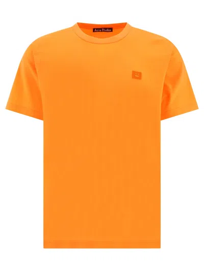 Shop Acne Studios Face T-shirts In Orange