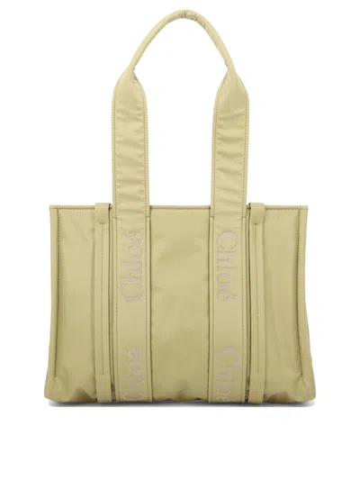 Shop Chloé Woody Medium Shoulder Bags In Beige