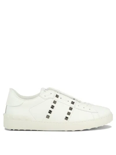 Shop Valentino Rockstud Untitled Sneakers & Slip-on In White