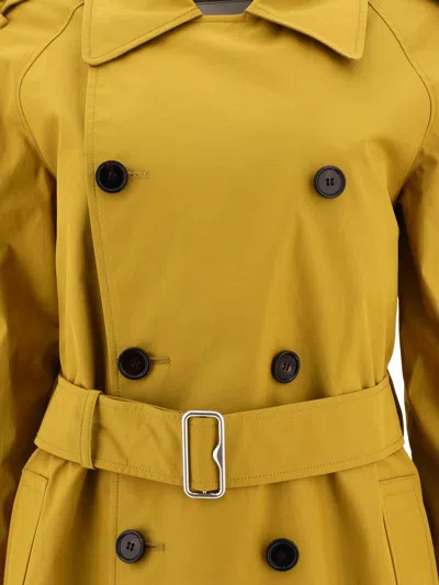 Shop Burberry Long Gabardine Trench Coat Coats Yellow