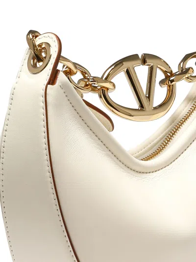 Shop Valentino Mini Vlogo Moon Shoulder Bags White