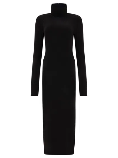 Shop Norma Kamali Turtleneck Side Slit Gown Dresses Black