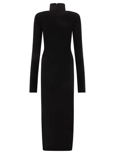 Shop Norma Kamali Turtleneck Side Slit Gown Dresses Black