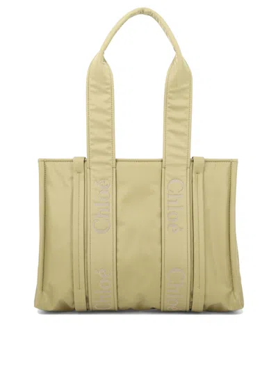 Shop Chloé Woody Medium Shoulder Bags Beige